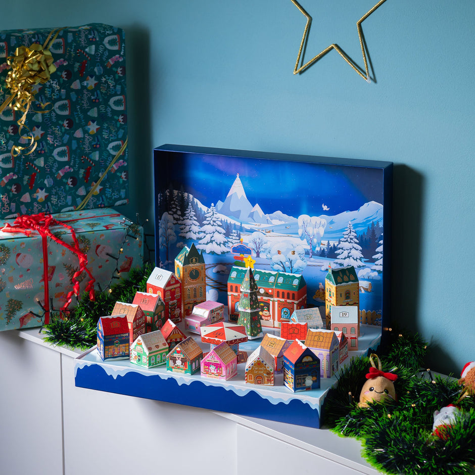 Legami Dream Peaks Advent Calendar set up as a snowy Christmas village