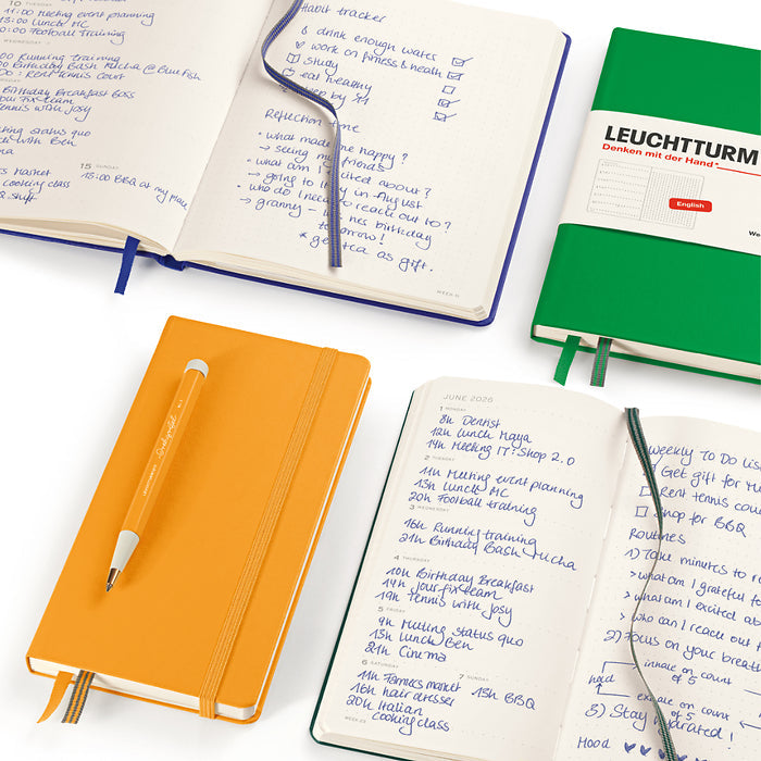 Leuchtturm1917 2026 academic planners in orange and green with notes and to-do lists, ideal for students and professionals.