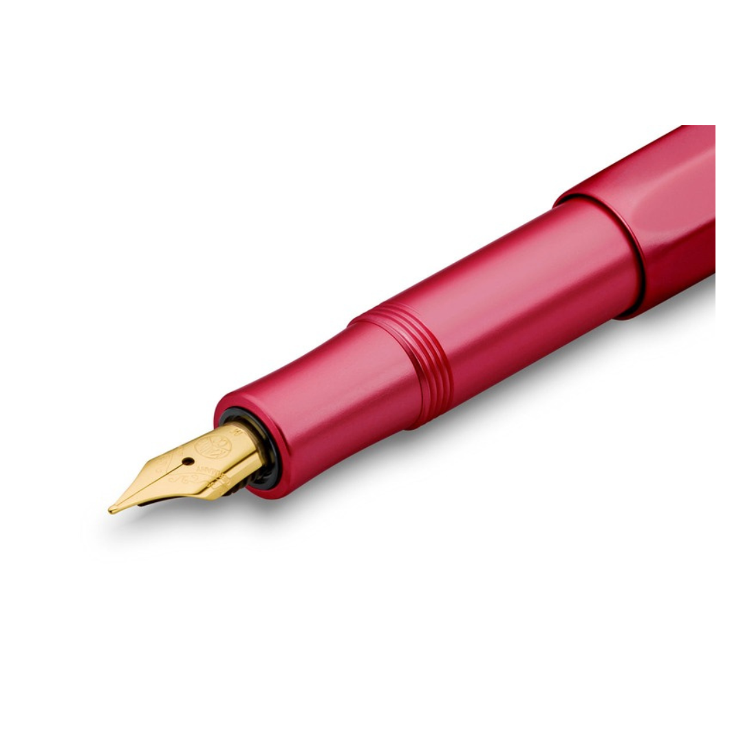 Kaweco Collection Ruby fountain pen, gold nib close-up, on white