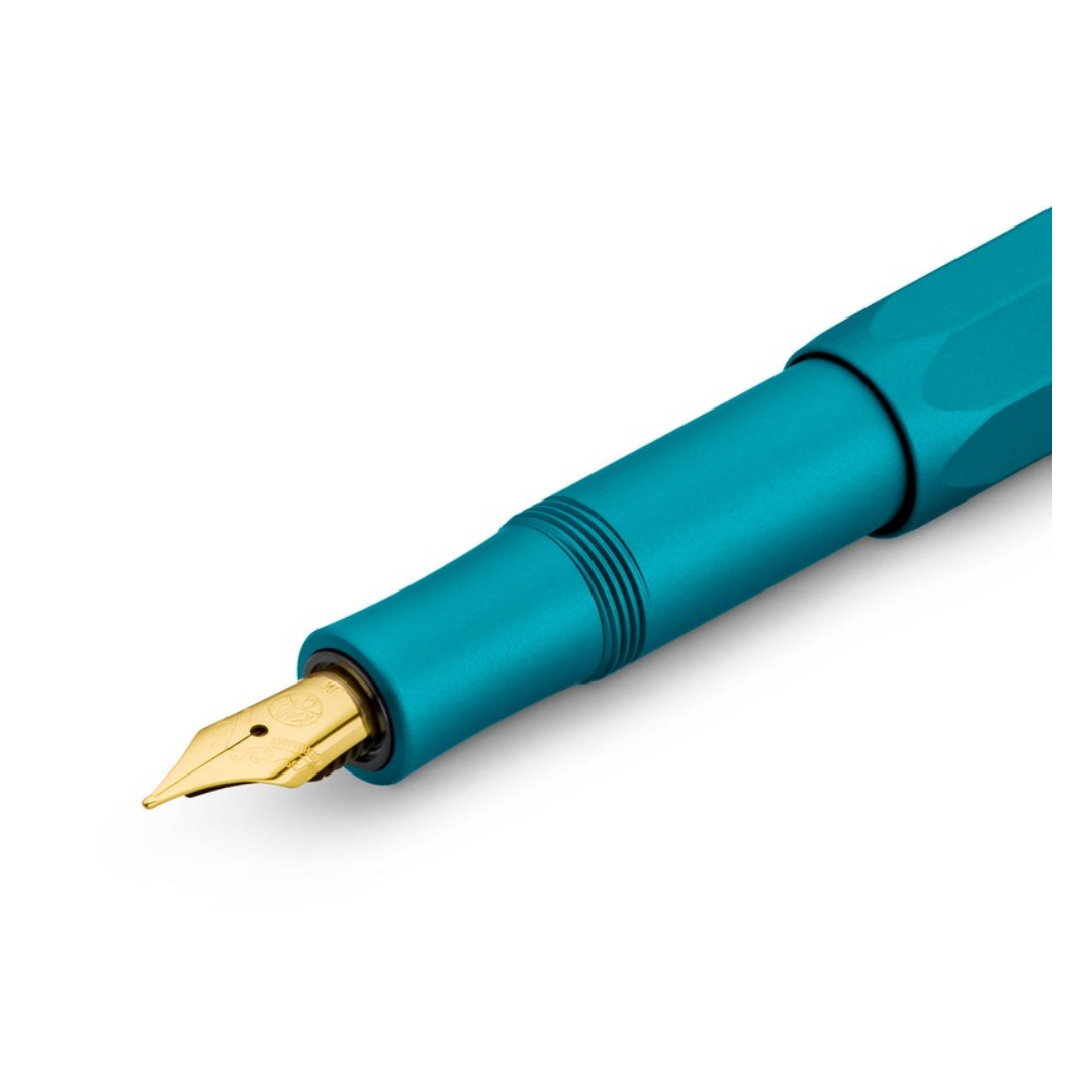 Kaweco Collection Iguana Blue fountain pen, gold nib close-up, on white