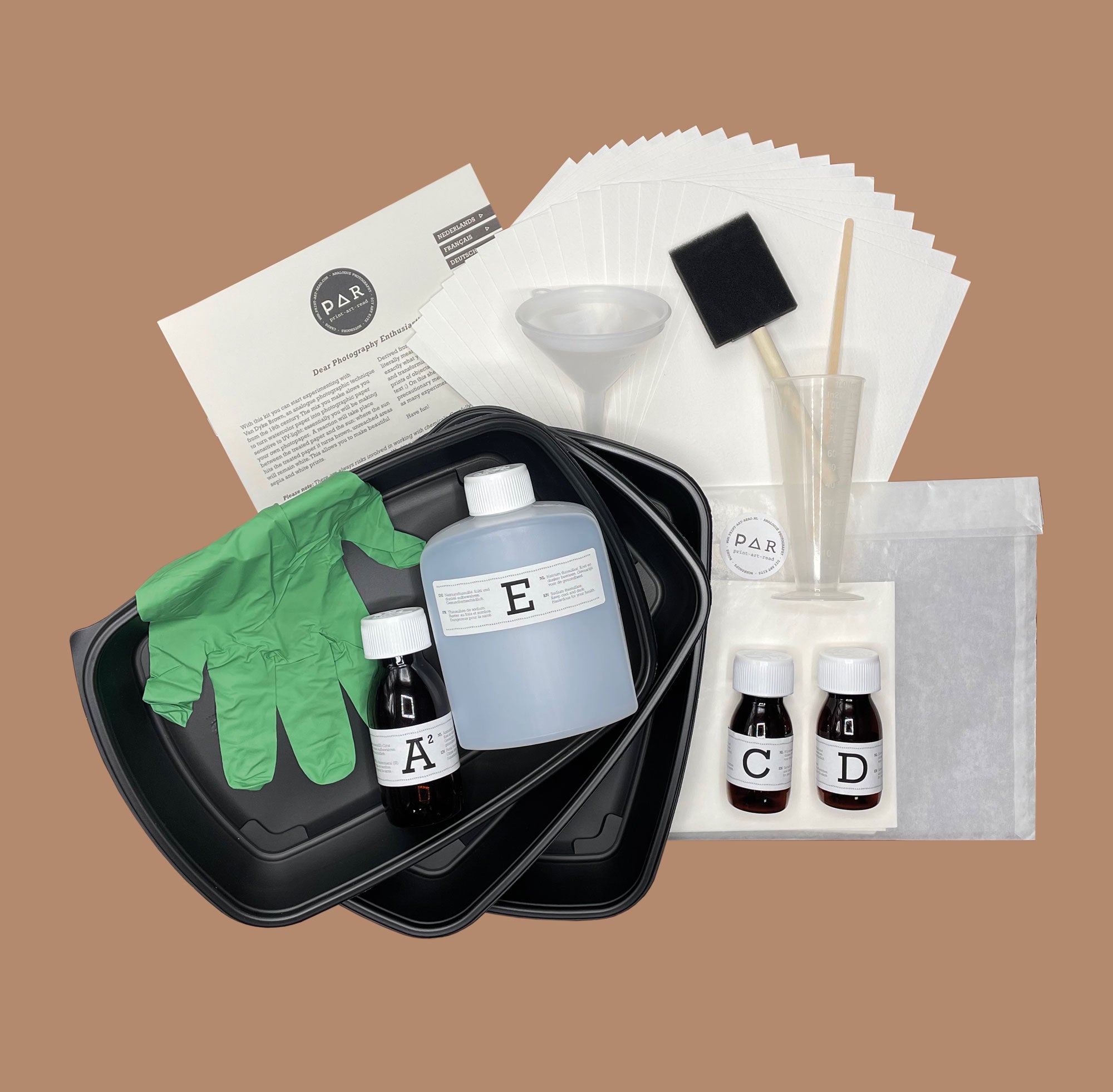 Contents of the PAR Van Dyke kit – chemical bottles, trays, funnel, gloves and instructions