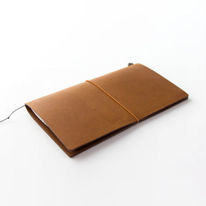 TRAVELER'S notebook Camel Regular Size shown with its blank MD Paper refill