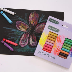 Elements Oil Pastels with a flower drawing on black paper