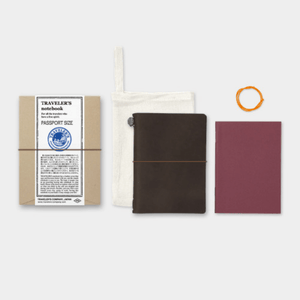 TRAVELER’S notebook – Passport Size Brown with leather cover and MD Paper notebook, ideal for everyday carry and passport case use.