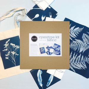 PAR Cyanotype Fabric Kit box with Prussian blue botanical sun prints on fabric and tote bag