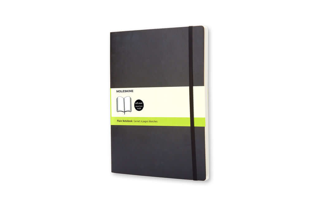 Moleskine Classic Extra Large Plain Softcover Notebook - Black with plain pages and elastic closure.