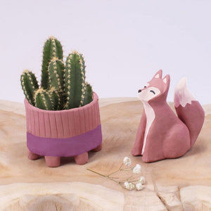 Handmade terracotta clay cactus pot and fox figurine crafted from air dry clay, showcasing smooth finish and vibrant design.