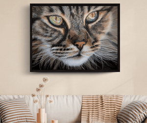 Framed cat portrait hanging above a modern sofa, showcasing detailed brush strokes and lifelike colors by bradburyART.