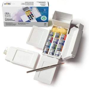 Winsor & Newton Cotman Watercolours Field Box – 12 Half Pans set with paintbrush and packaging, ideal for travel painting.