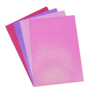 Dovecraft Glitter Card A4 Pad – Perfectly Pink (24 Sheets) featuring four pink-toned shades of glitter cardstock for papercraft projects.