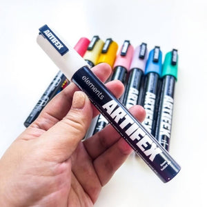 Hand holding Elements Artifex Acrylic Paint Markers – 8 Pastel Colours, 5–6 mm Bullet Tip, showcasing vibrant pastel marker collection