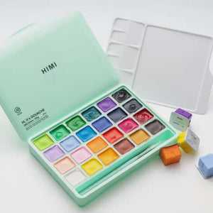 HIMI Jelly Cup Gouache Set - 24 Colours (Green Case) with vibrant paints on display