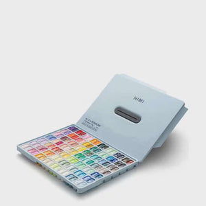 HIMI Twin Cup Gouache Set - 112 Colours (Ice Blue Case) with open palette displaying vibrant shades for painting and mixing.