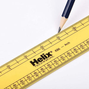 Close-up of Helix 30cm Architects Scale Ruler with metric graduations and a pencil, ideal for professional use.