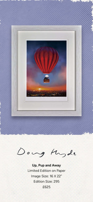 Framed artwork 'Up, Pup and Away' by Doug Hyde featuring a red balloon with a character and black Labrador soaring over city lights.