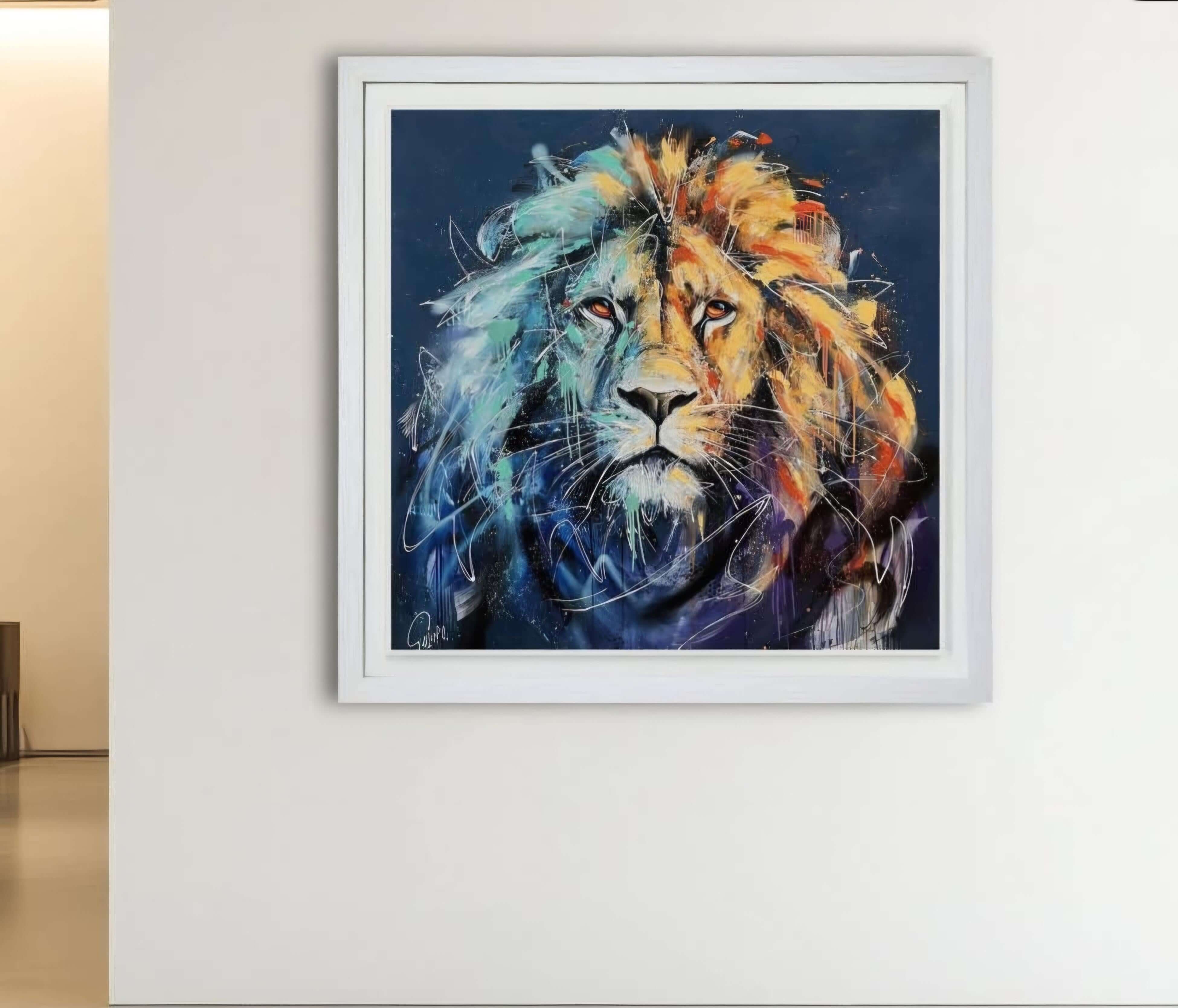 Maximus Deluxe by Joe Galindo, colorful lion portrait framed on a wall, showcasing vibrant abstract art style.