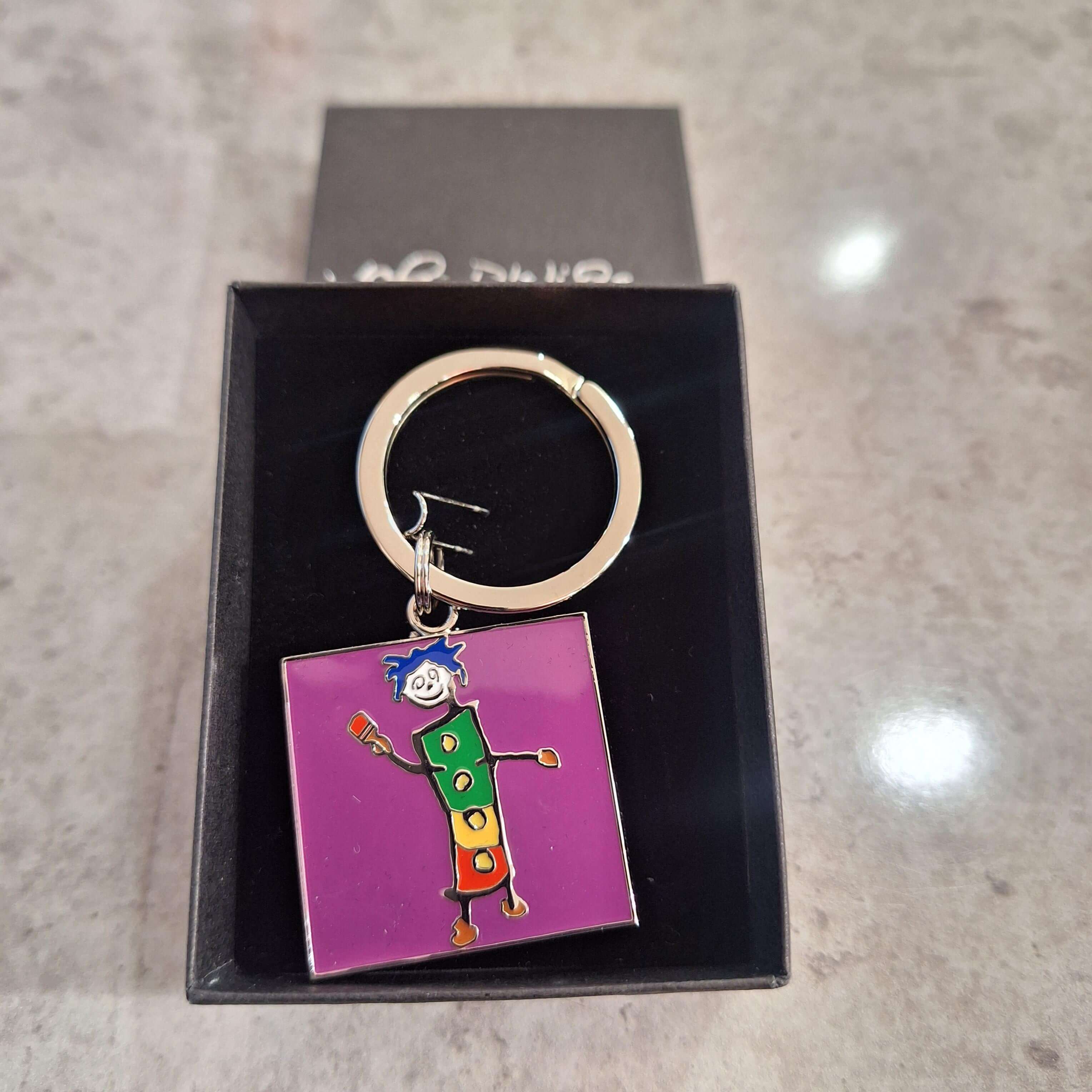 Painting the Town Red Keyring by John D Wilson