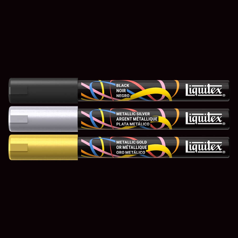 Liquitex acrylic markers set of 3 including black, metallic silver, and metallic gold markers.