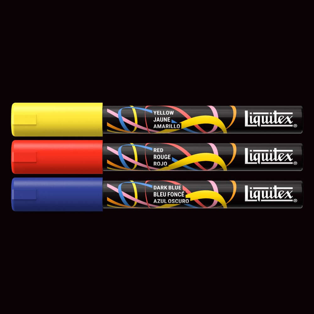 Liquitex acrylic markers set featuring yellow, red, and dark blue 2mm markers on a black background.