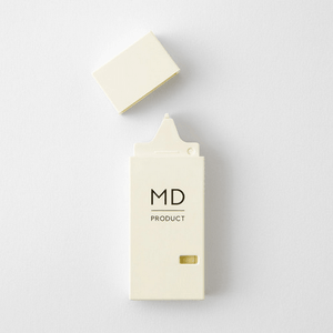 MD Correction Tape in cream-colored packaging, featuring a removable cap and clean design.
