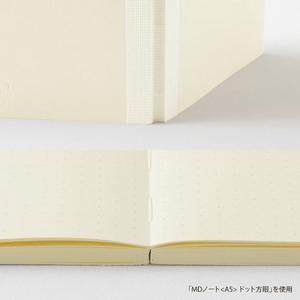 A6 dot grid notebook showing the flat binding and smooth, high-quality MD PAPER for an enjoyable writing experience.