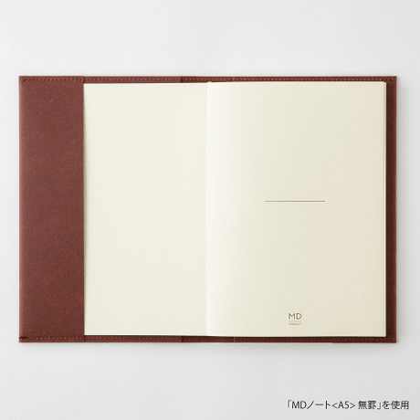 Open MD Notebook Hard Cover A5 showcasing its smooth, firm paper and elegant design for versatile writing.