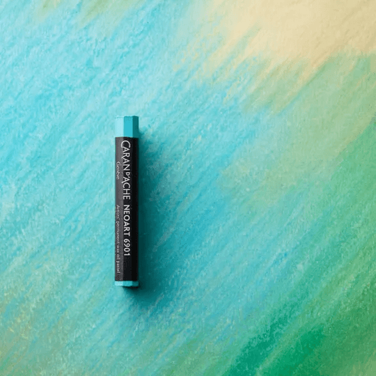 Caran d'Ache Neoart 6901 professional water-resistant oil pastel on colorful background.