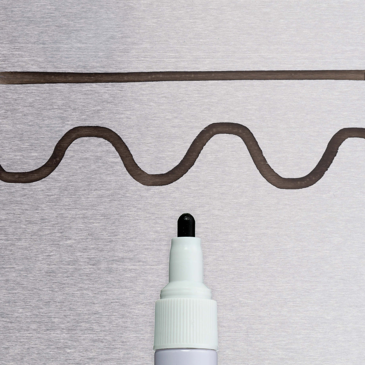 Sakura Metal Marker black line sample on metal