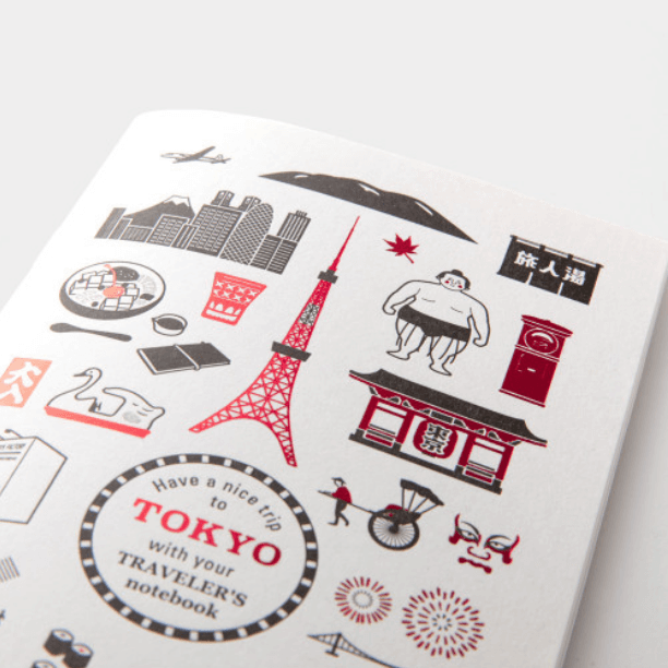 Cover of TRAVELER’S Limited Edition Notebook TOKYO Refill – Blank showing Tokyo-themed illustrations, including local sights and foods.