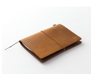 TRAVELER’S notebook – Passport Size Brown with handmade leather cover and MD Paper notebook, ideal for everyday carry.