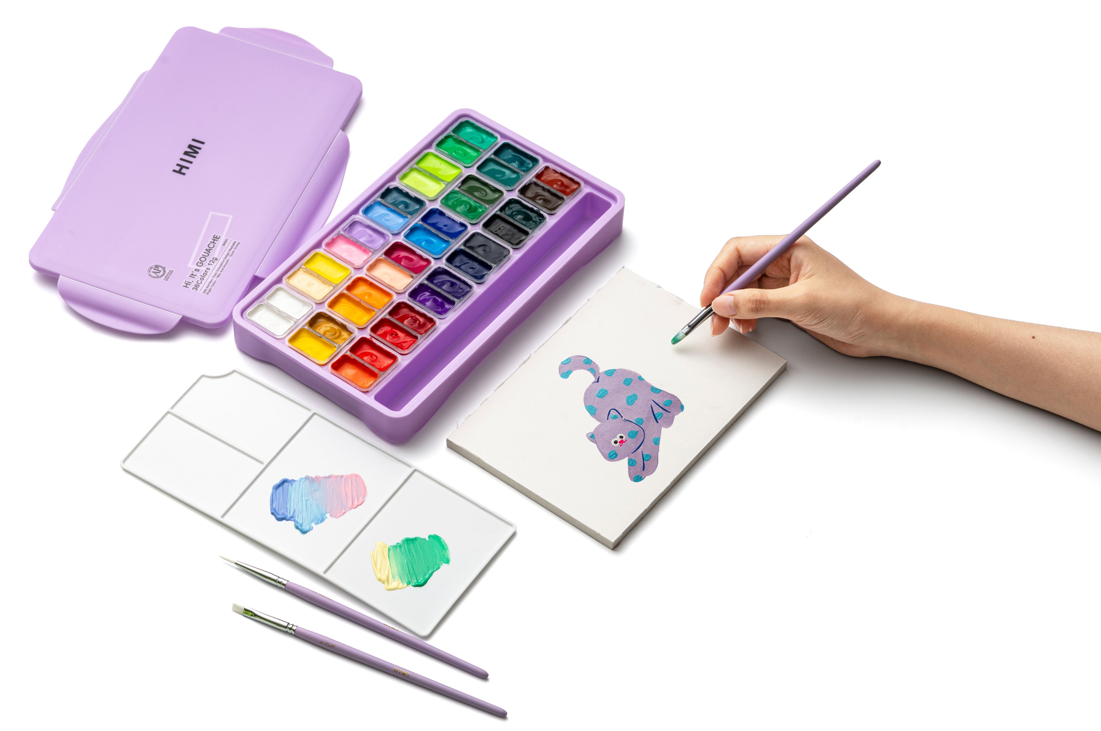 HIMI Twin Cup Gouache Set - 36 Colours + 3 Brushes (Purple Case) shown in use.