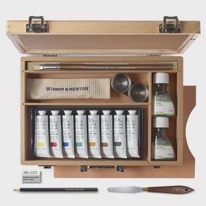 Winsor & Newton Artists' Oil Studio Case – 18 Piece Wooden Set with oils, brushes, and accessories inside open wooden box.