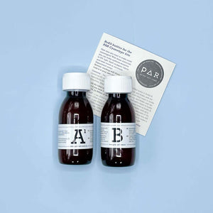 Cyanotype Refill Set – 2x 250ml Sensitiser Bottles (A + B) with instruction leaflet on blue background