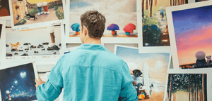 Doug Hyde Beach Buddies – Limited Edition Giclée Print, Framed displayed on a wall of art prints.