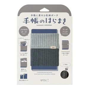 Notebook's Haramaki A6 - B6 Book Band Midori packaging with stretchable pockets and band, ideal for holding pens and notes.