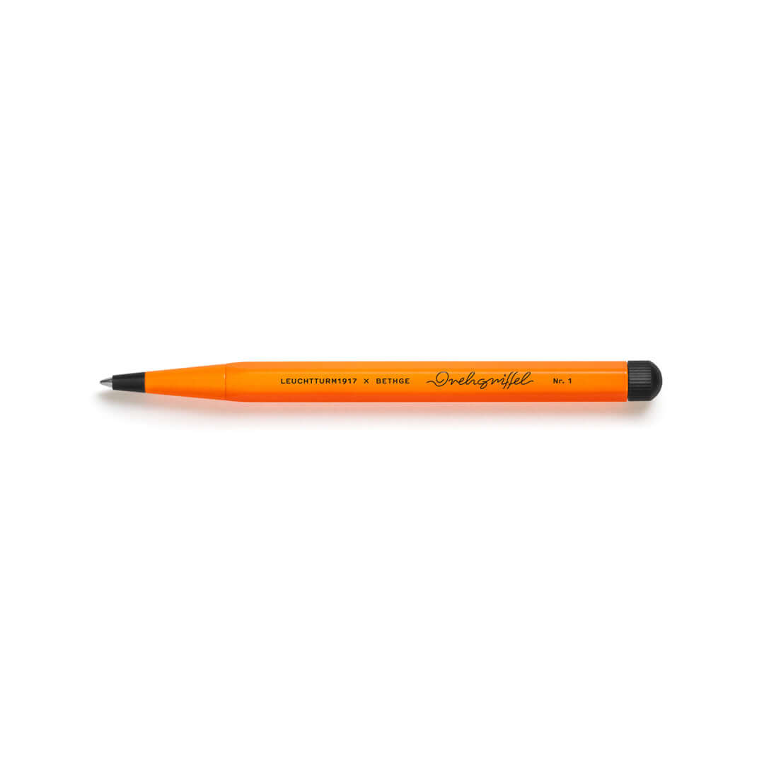 Leuchtturm1917 Drehgriffel Nr. 1 – Luminous Edition Ballpoint Pen in neon orange with black accents, made from aluminium and brass.