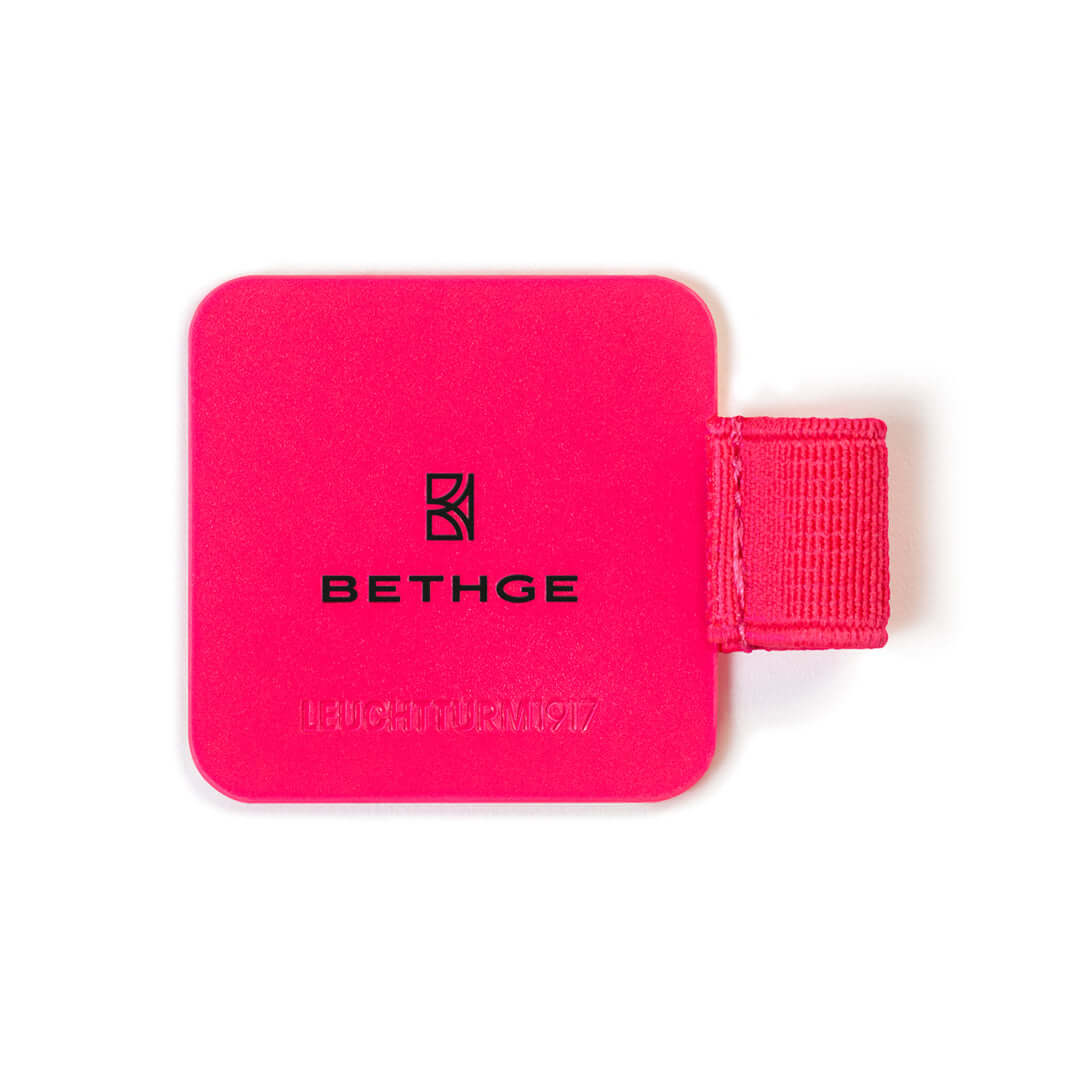 Leuchtturm1917 Pen Loop – Luminous Edition in bold neon color, featuring adhesive backing and durable elastic loop for pencils and pens.