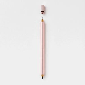 Tom’s Studio Lumos Duo Tip Refillable Fineliner & Brush Pen shown with cap off, highlighting the interchangeable tips.