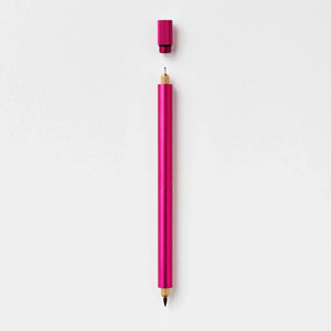 Tom’s Studio Lumos Duo Tip Refillable Fineliner & Brush Pen in pink with cap removed, showing dual tip design.