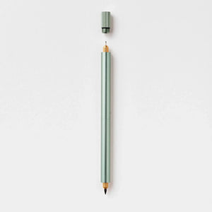 Tom’s Studio Lumos Duo Tip Refillable Fineliner & Brush Pen with dual interchangeable tips on light background