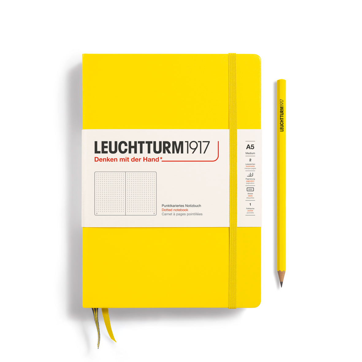 Leuchtturm1917 Classic Notebook – A5 Hardcover in vibrant yellow with pencil, featuring FSC-certified paper for quality and durability.