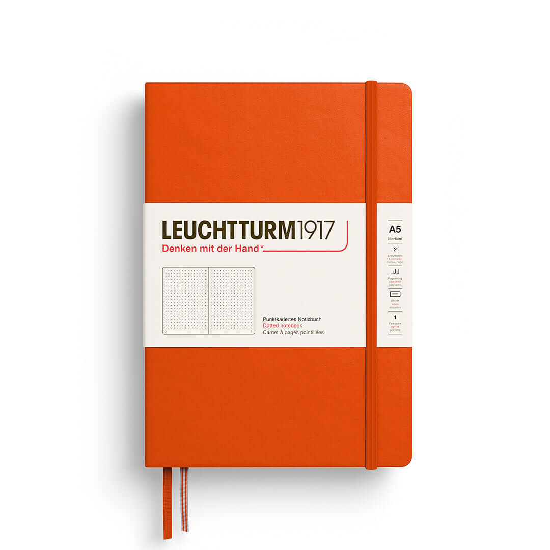Leuchtturm1917 Notebook A5 Hardcover – 2026 Colours, Plain / Dotted / Lined / Squared in orange with elastic closure.