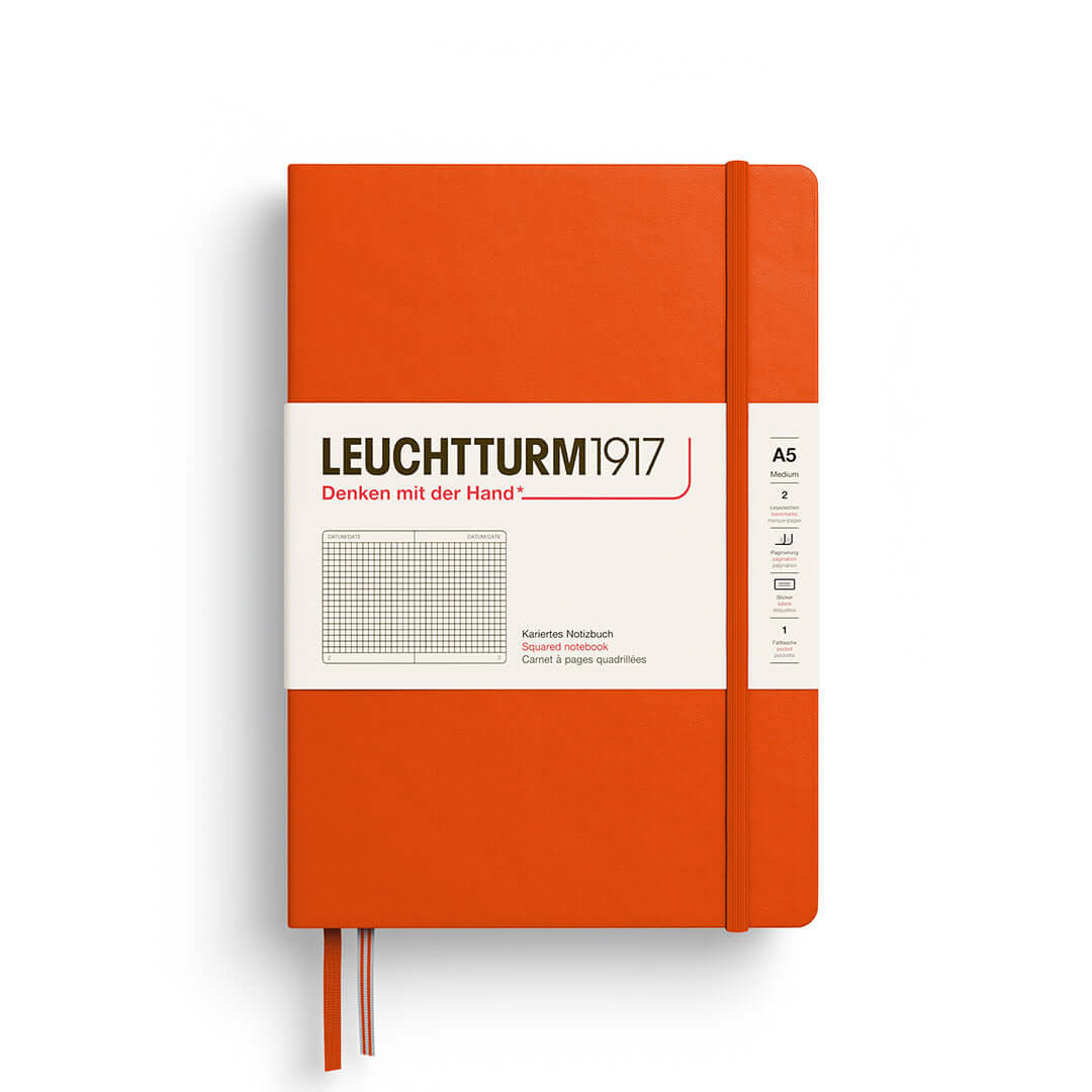 Leuchtturm1917 Notebook A5 Hardcover – 2026 Colours featuring squared pages and vibrant orange cover, perfect for planning and journaling.