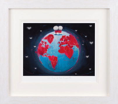 Framed art print "On Top of the World by Doug Hyde" showing two figures sitting on a world with red hearts, limited edition.