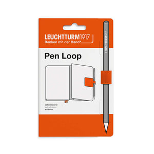 Leuchtturm1917 Pen Loop – 2026 Colours packaging in orange, featuring a self-adhesive loop for notebooks.