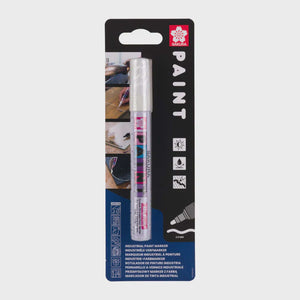 Sakura Paint Marker Medium White in packaging, ideal for various surfaces including wood, metal, glass, and more.