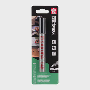 Sakura Pen-Touch 140 Black marker with chisel tip for marking on cardstock, plastic, and more in packaging.