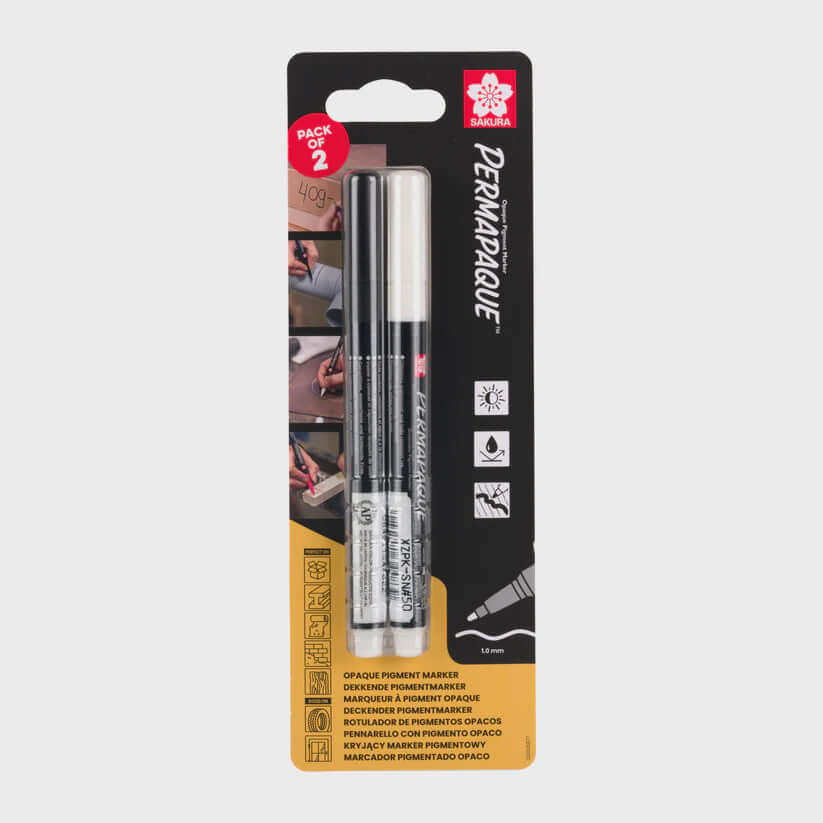 Sakura Permapaque Fine set | Black + White markers in packaging showcasing fine tip and opacity.