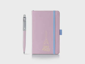 Sheaffer Emily in Paris Gift Set – Sentinel 321 Pink Ballpoint & Small Notebook with heart-shaped clip emblem.