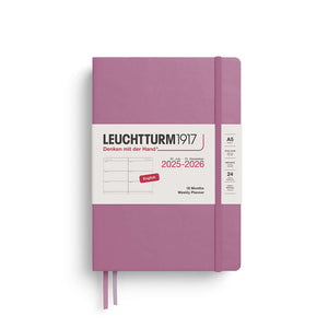 Medium A5 Weekly Planner 2025-2026 in pink, ideal for organizing schedules and goals over 18 months.
